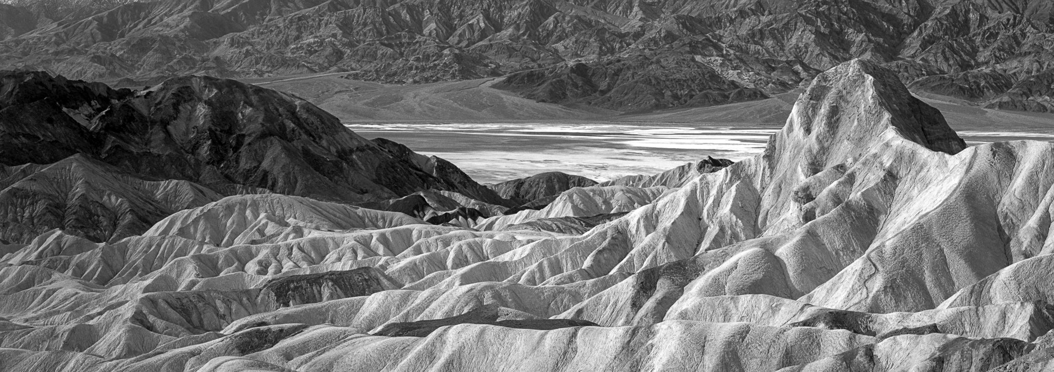 Fine art landscape photography print: Zabriskie Point Black and White Pano